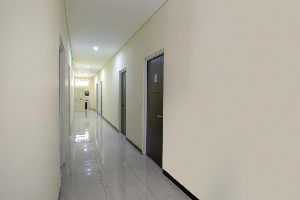SPOT ON 2246 Kost 97 Syariah Hotel Palembang Bagian luar foto